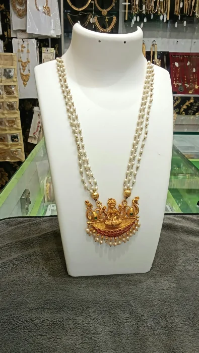 Accent Three Line Pearl Necklace with Lakshmi Pendent